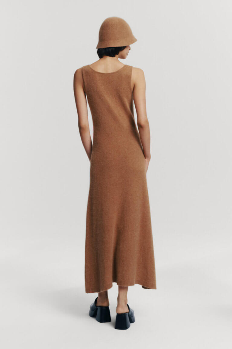 Atthrea golden beige knitwear maxi dress with an elegant flared shape and oval neckline - back view